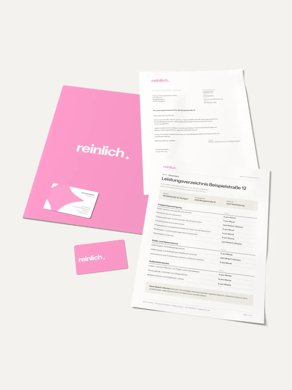 reinlich: stationery – pink folder with white wordmark, letterhead with cover letter, service schedule for Beispielstraße 12 listing each task with its frequency, and two business cards in pink and white